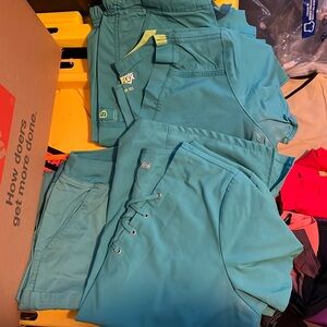 2 sets of teal scrubs 1- wondersrwink flex and other is buttersoft